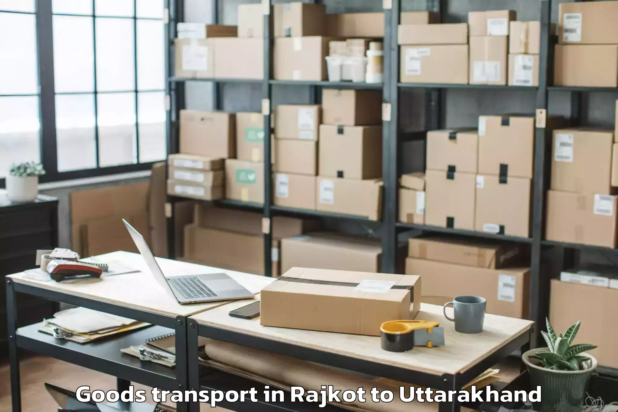 Book Rajkot to Hemwati Nandan Bahuguna Uttara Goods Transport Online